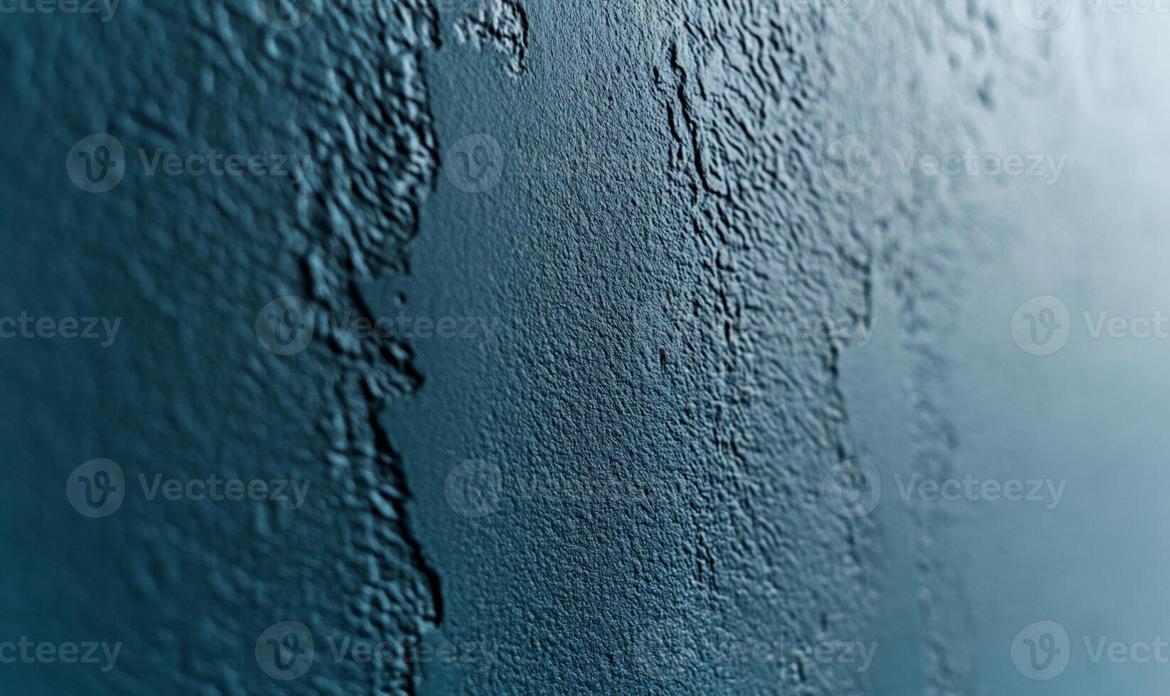 Textured teal wall with a rough, uneven surface photo