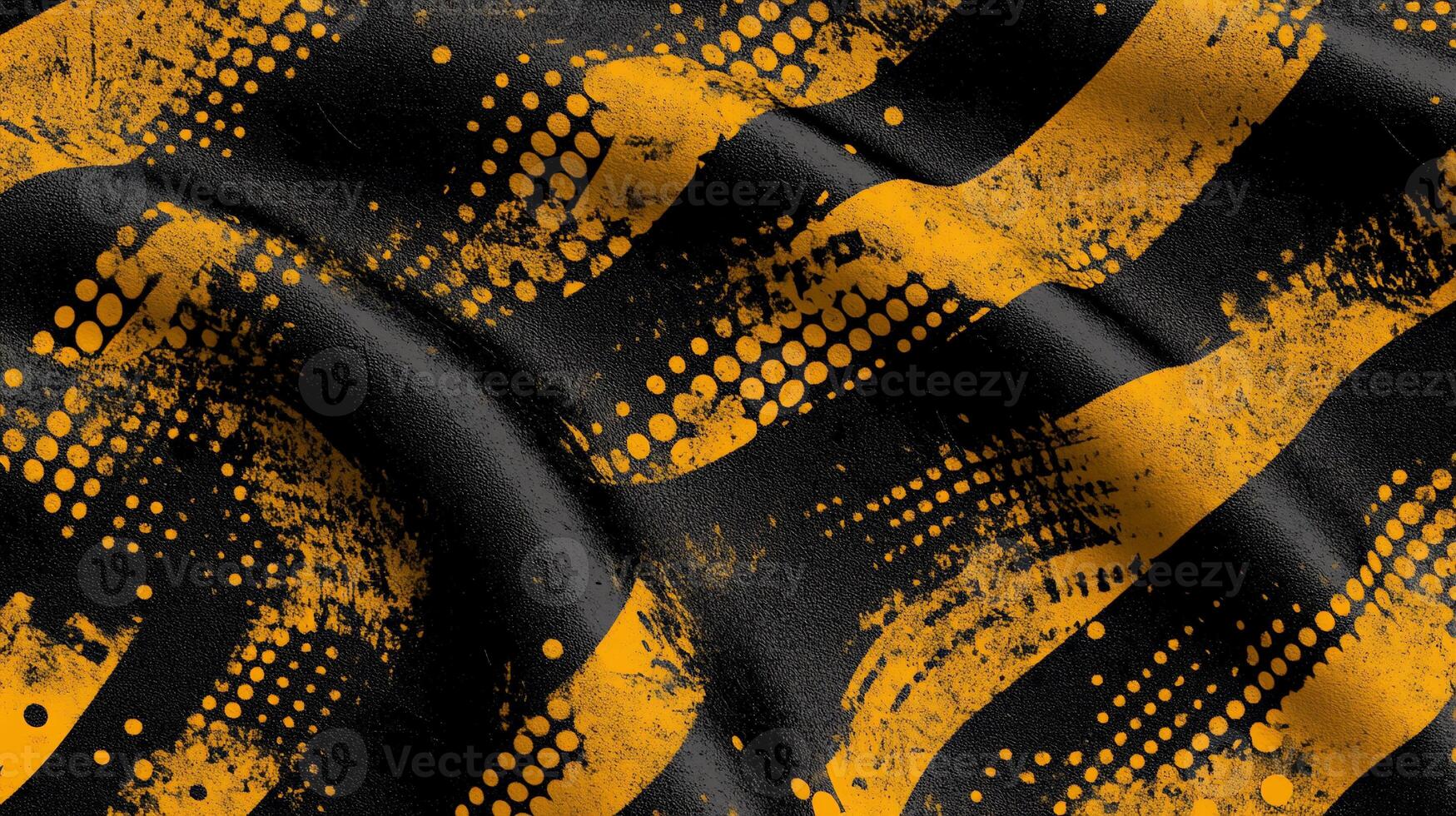 A black and yellow striped fabric with a black and white pattern photo