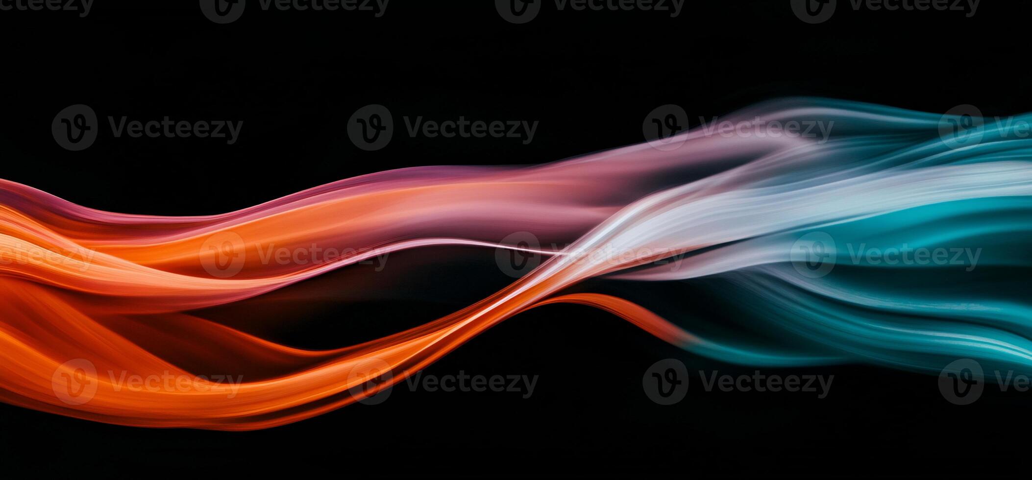Abstract flowing orange and teal waves on black background photo