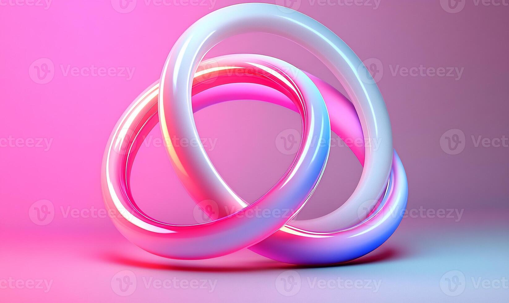 Intertwined iridescent rings on pink backdrop photo
