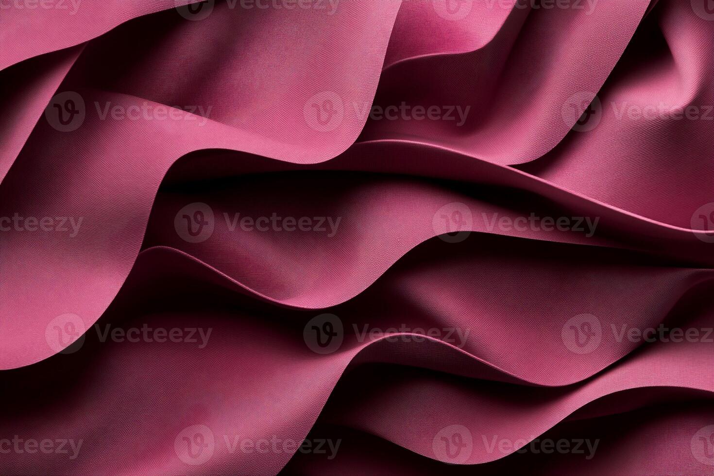Abstract waves of deep pink fabric, softly flowing photo