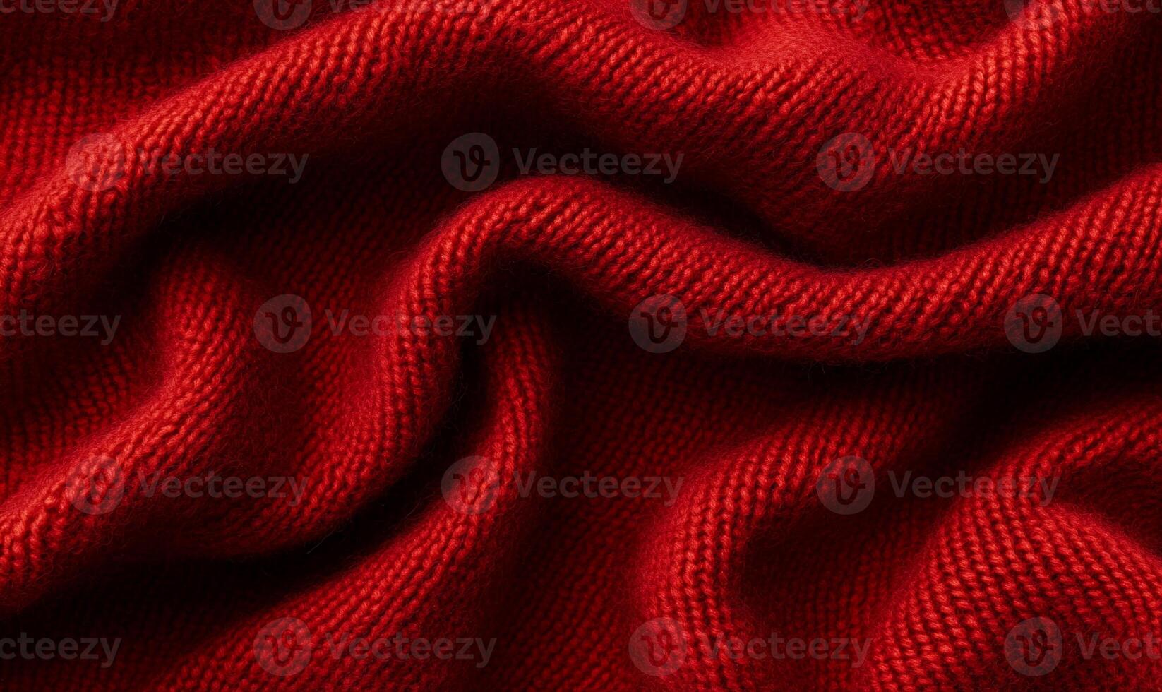 Rich red knitted fabric texture, softly draped photo