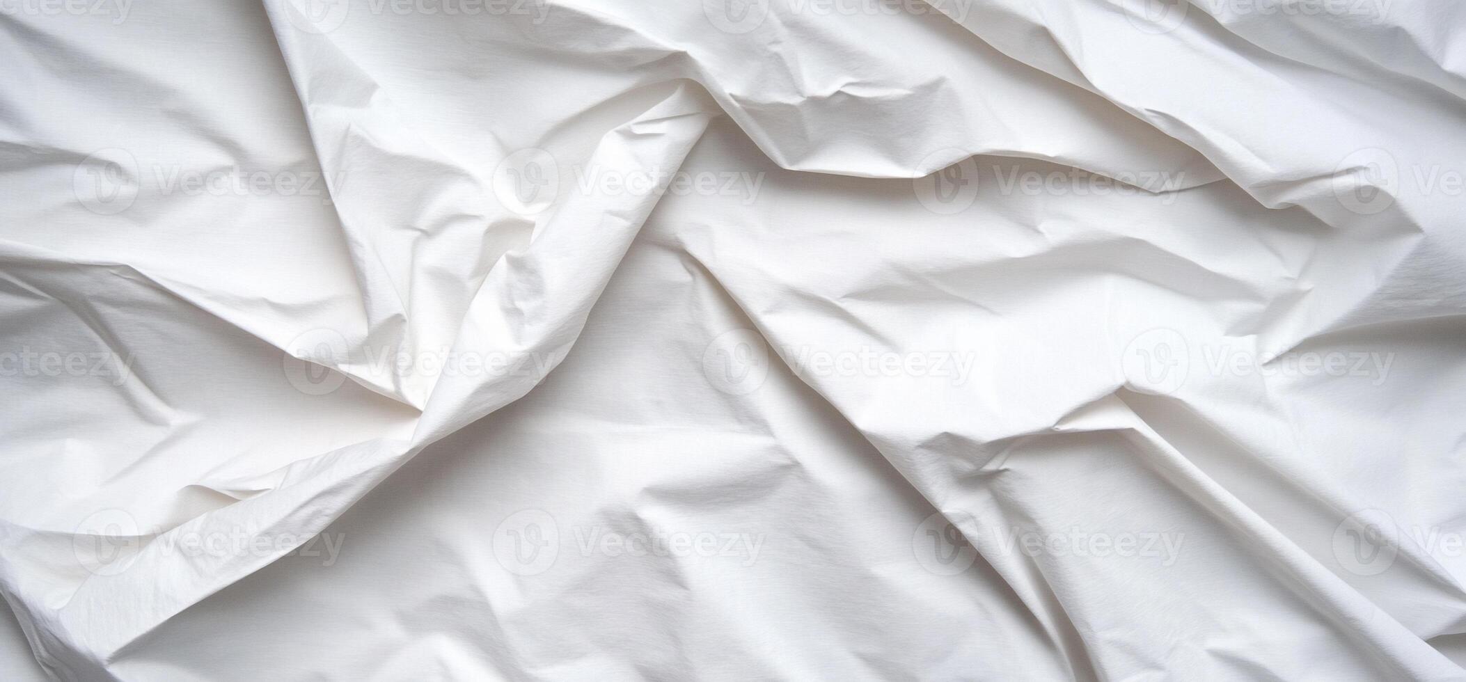 White fabric with folds and creases photo