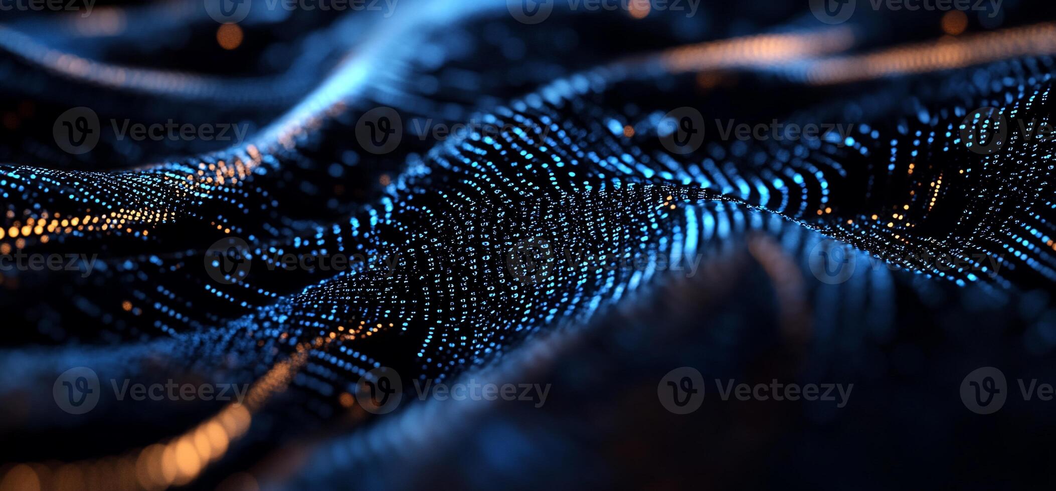Dark, flowing fabric with glowing blue and orange particles photo