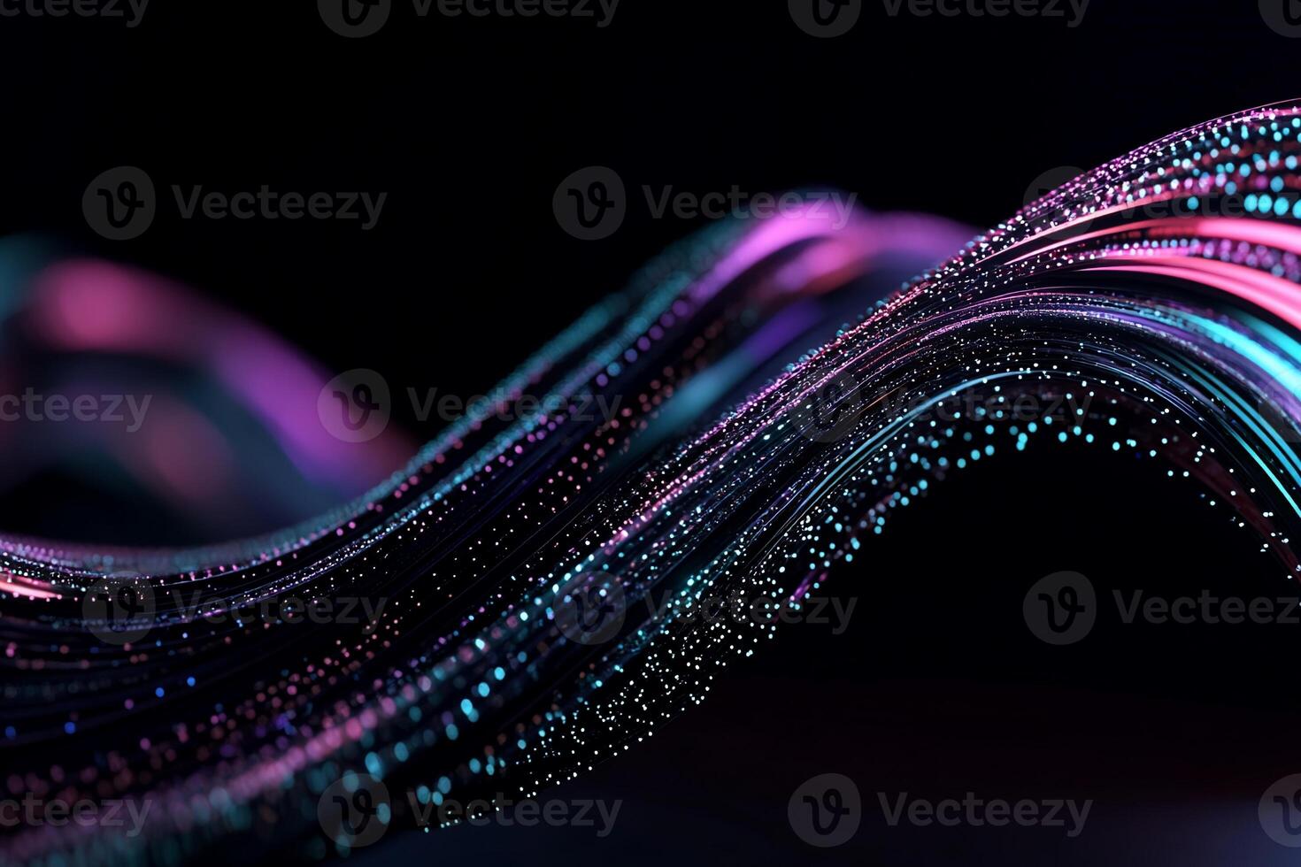 Glowing, swirling strands of light, textured with particles, against a dark background photo