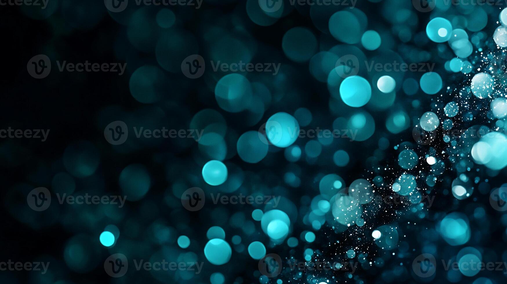 Teal bokeh lights on black background photo