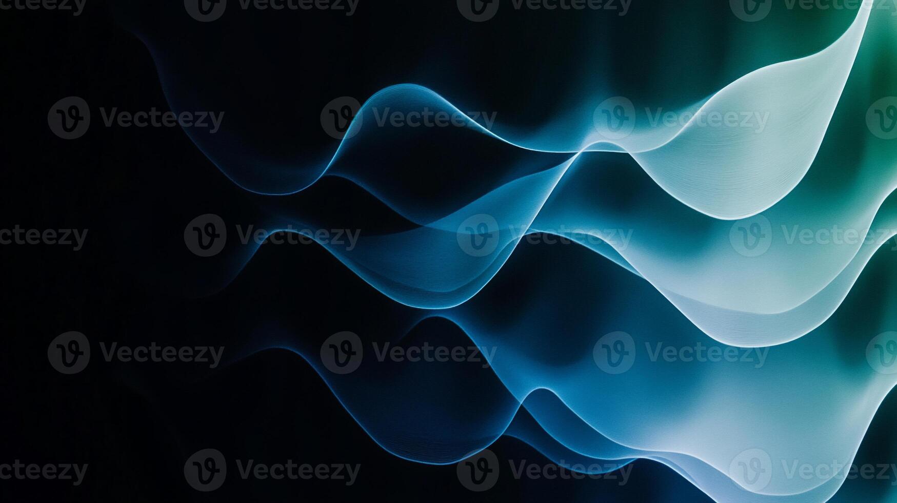 Abstract teal and blue wave patterns on black background photo
