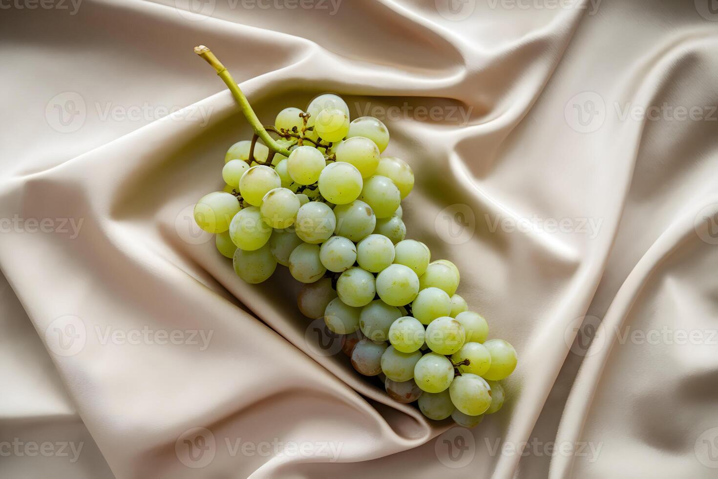 Green grapes atop beige fabric, fresh and inviting culinary composition photo