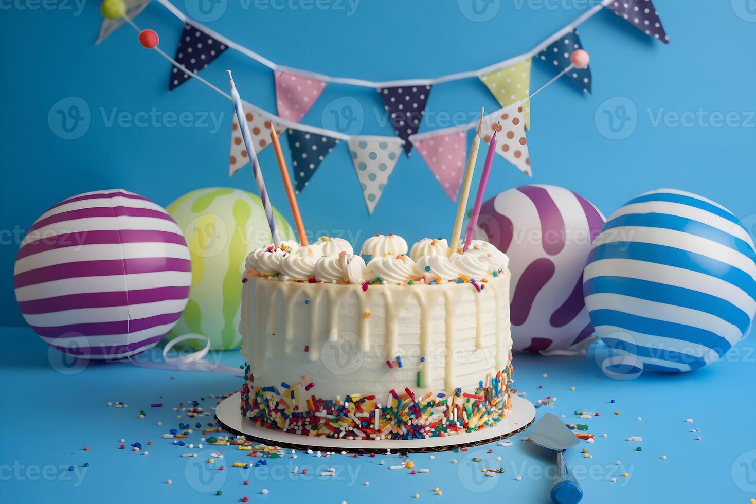 Festive cake with white icing and sprinkles, under cheerful bunting for celebrations photo