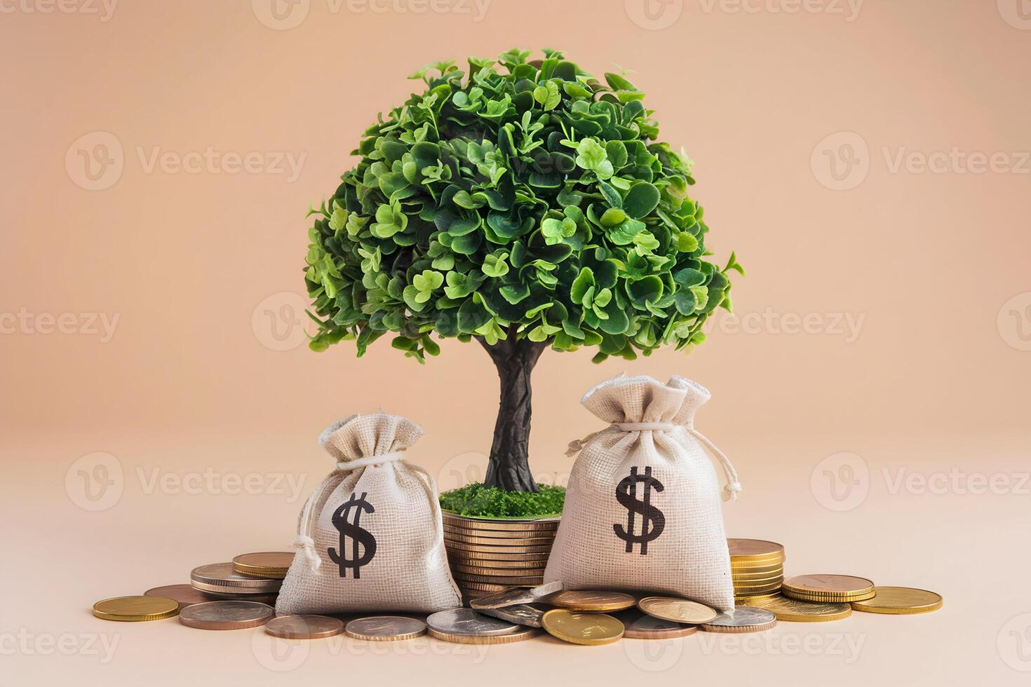 Green tree growing from coins with two money bags on either side photo