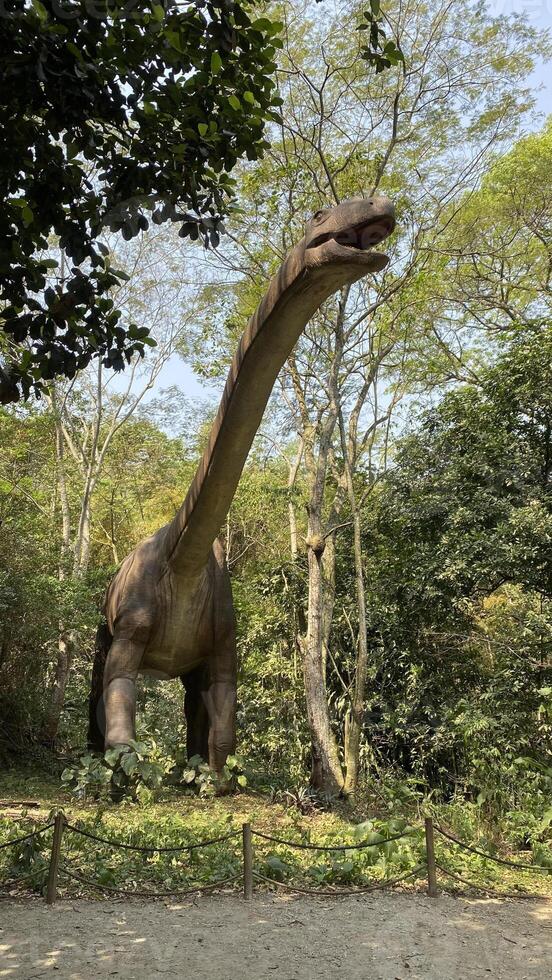 dinosaur forest nature giant tall prehistoric photo