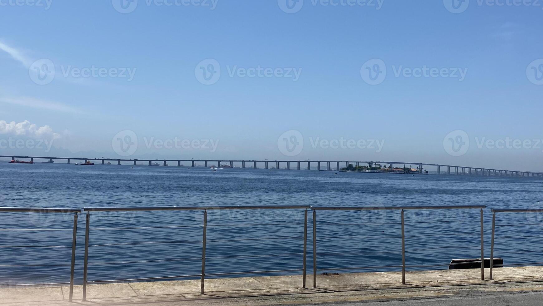 blue ocean long bridge view photo