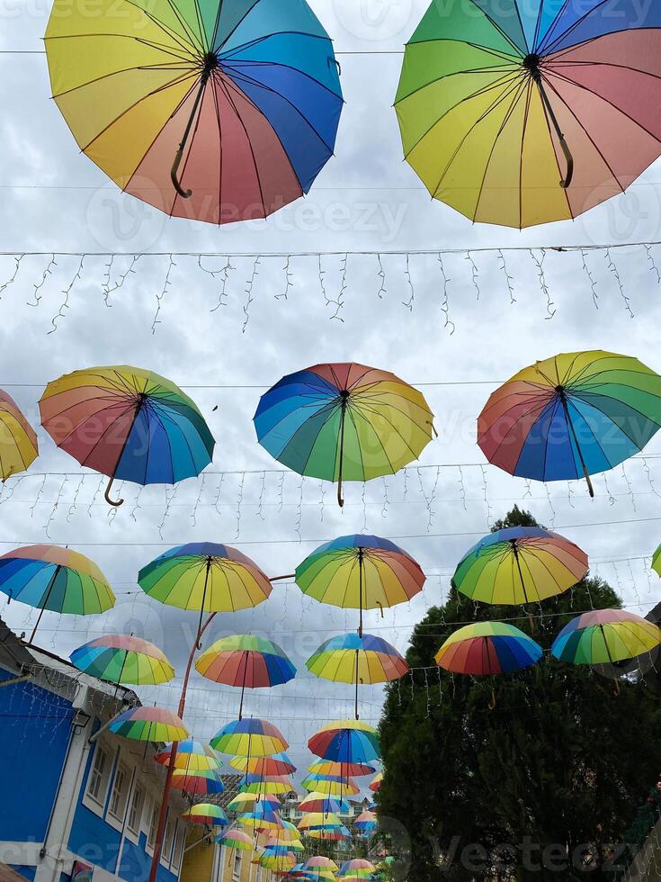 umbrellas sky colors street art in penedo photo