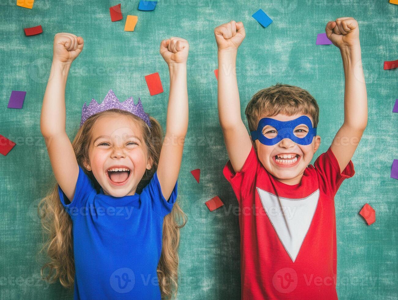 Happy children celebrating with raised arms and confetti on green background photo
