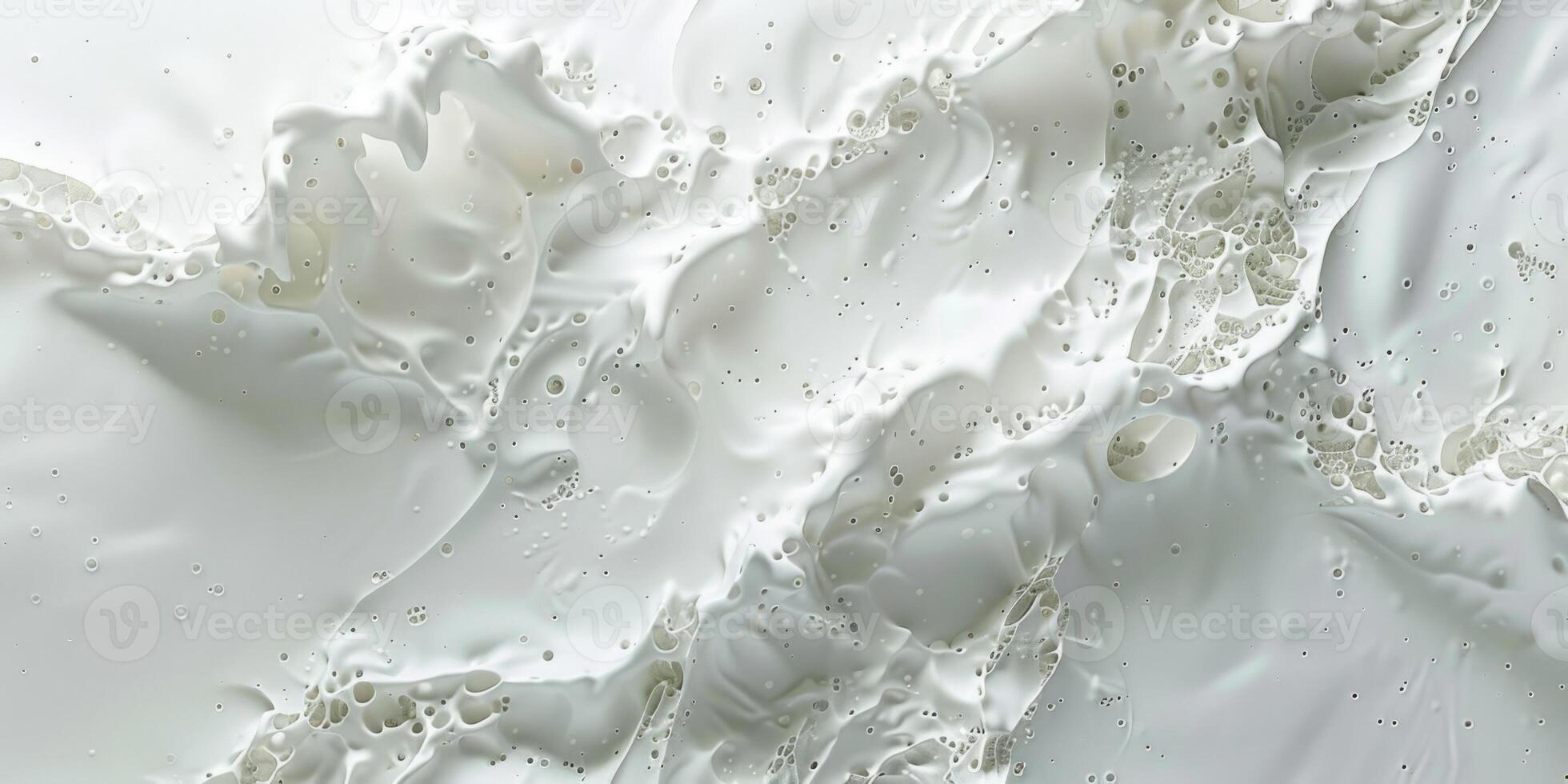 A white substance is being sprayed on a surface photo