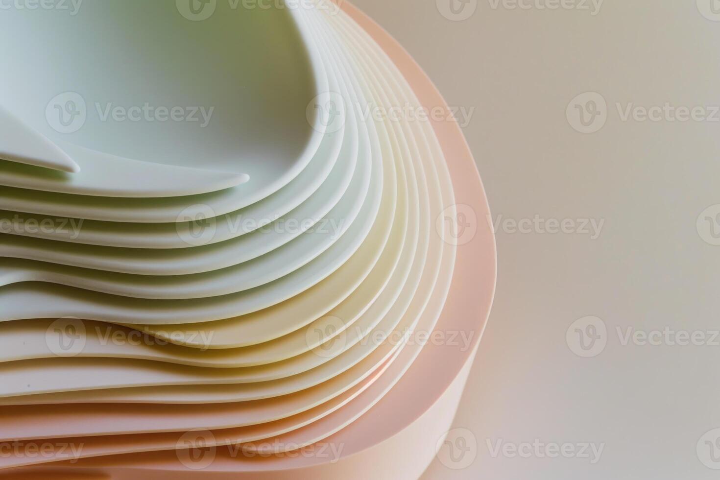 A stack of colorful plates on a white surface photo