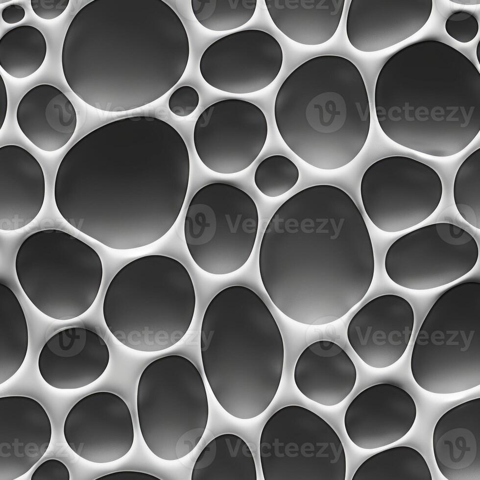 A black and white image of a pattern of holes photo