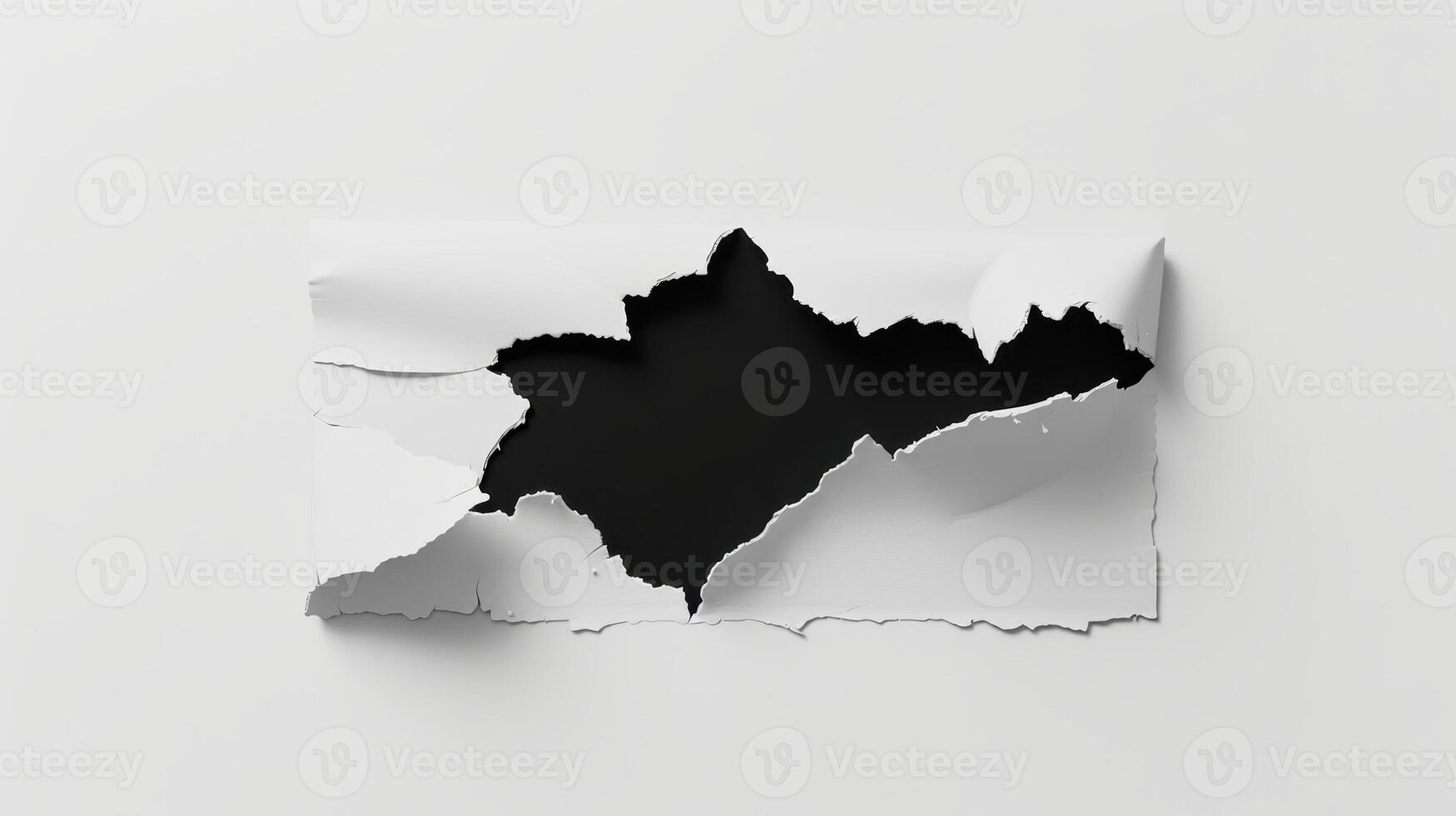 A black and white torn paper with a hole in it photo