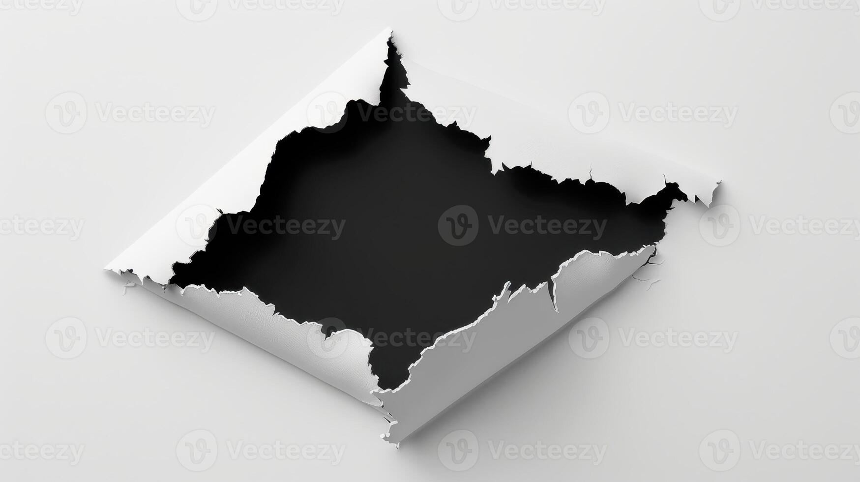 A hole in a white paper with a black hole photo