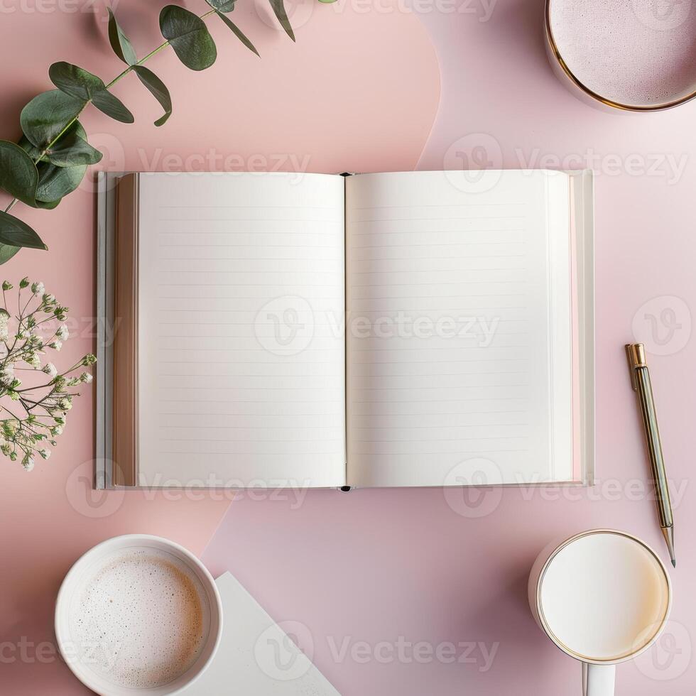 Open notebook, cup of coffee and pen on pink background photo