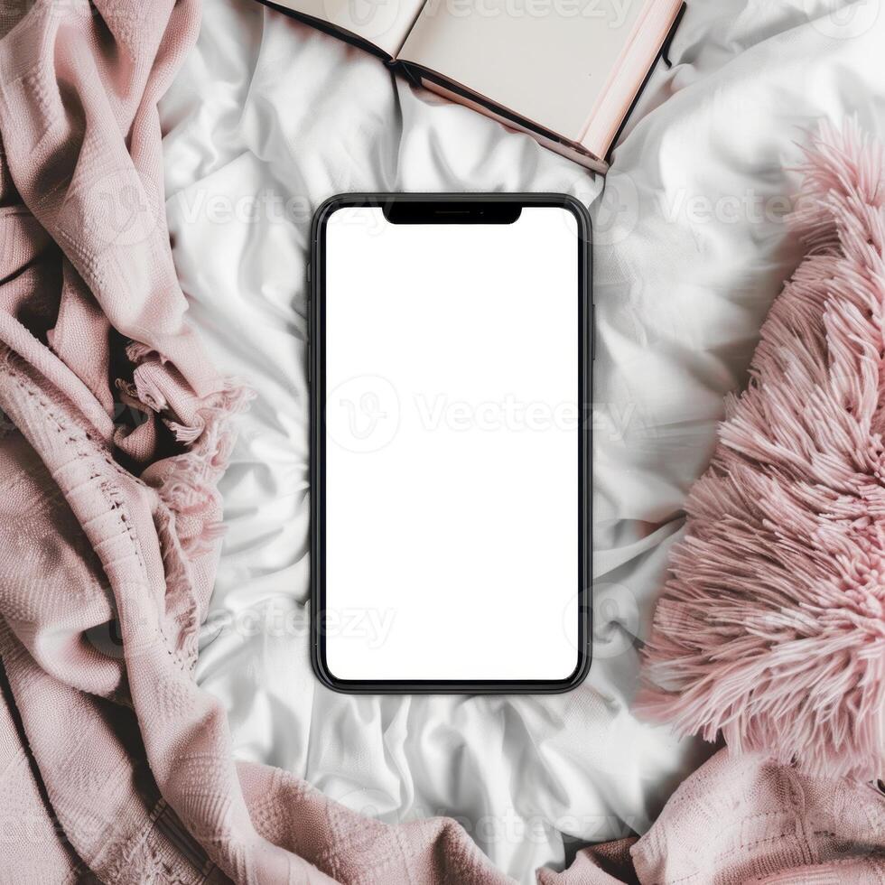 Blank iphone mockup on bed photo