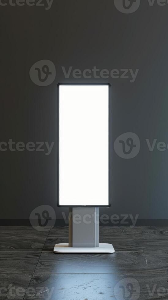 A blank billboard stands in front of a dark wall photo