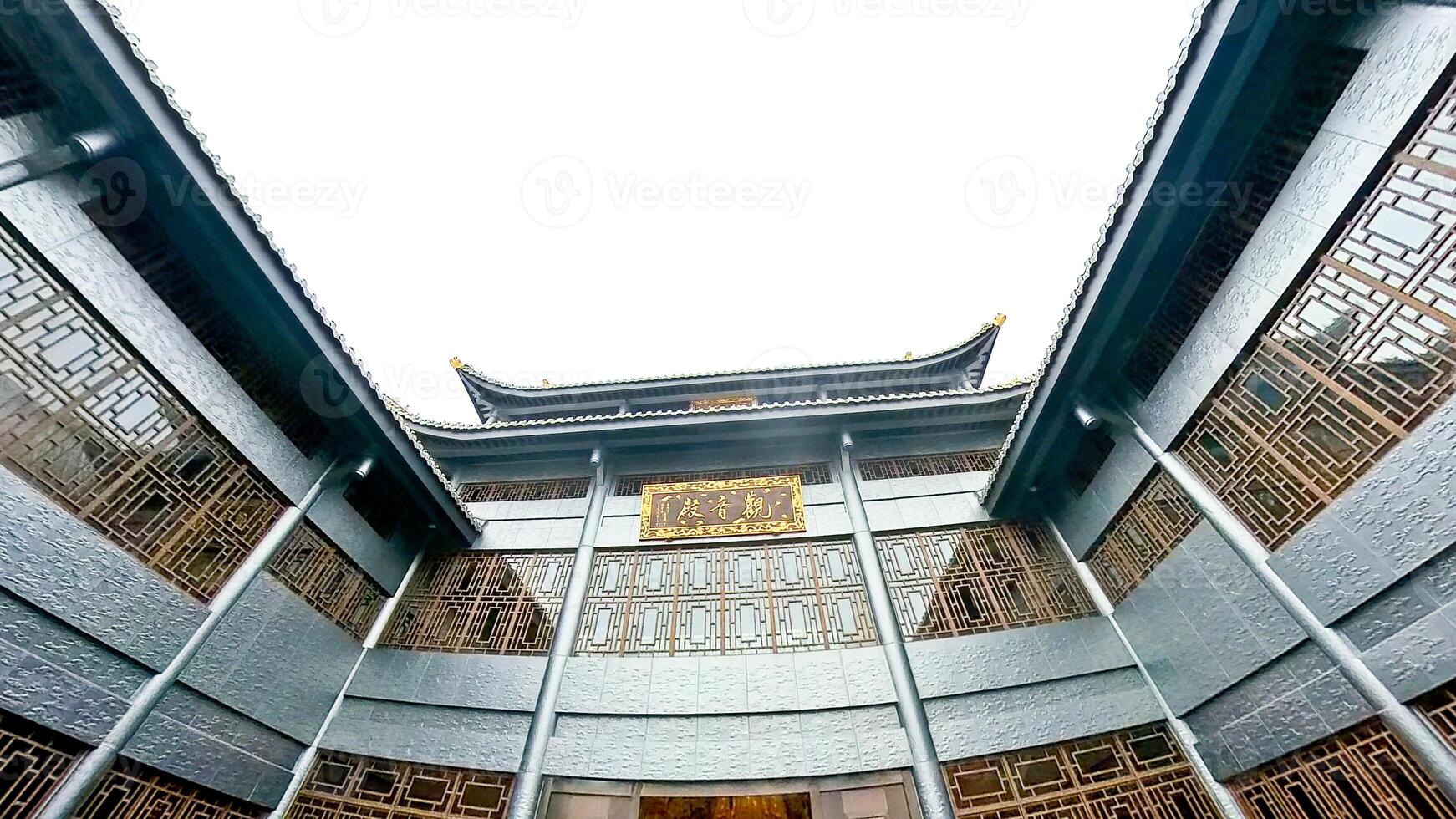 the inside of a building with a chinese style roof photo