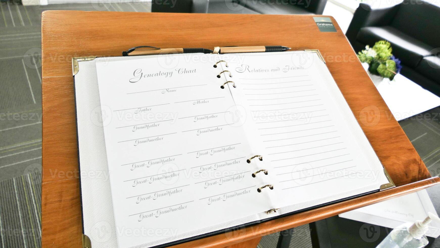 the signing of memorial book at a funeral service photo