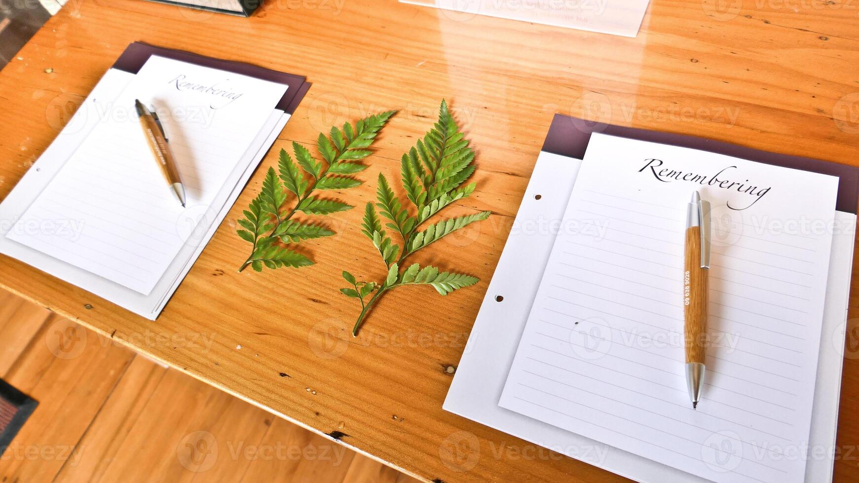 signing of memorial book at a funeral home photo