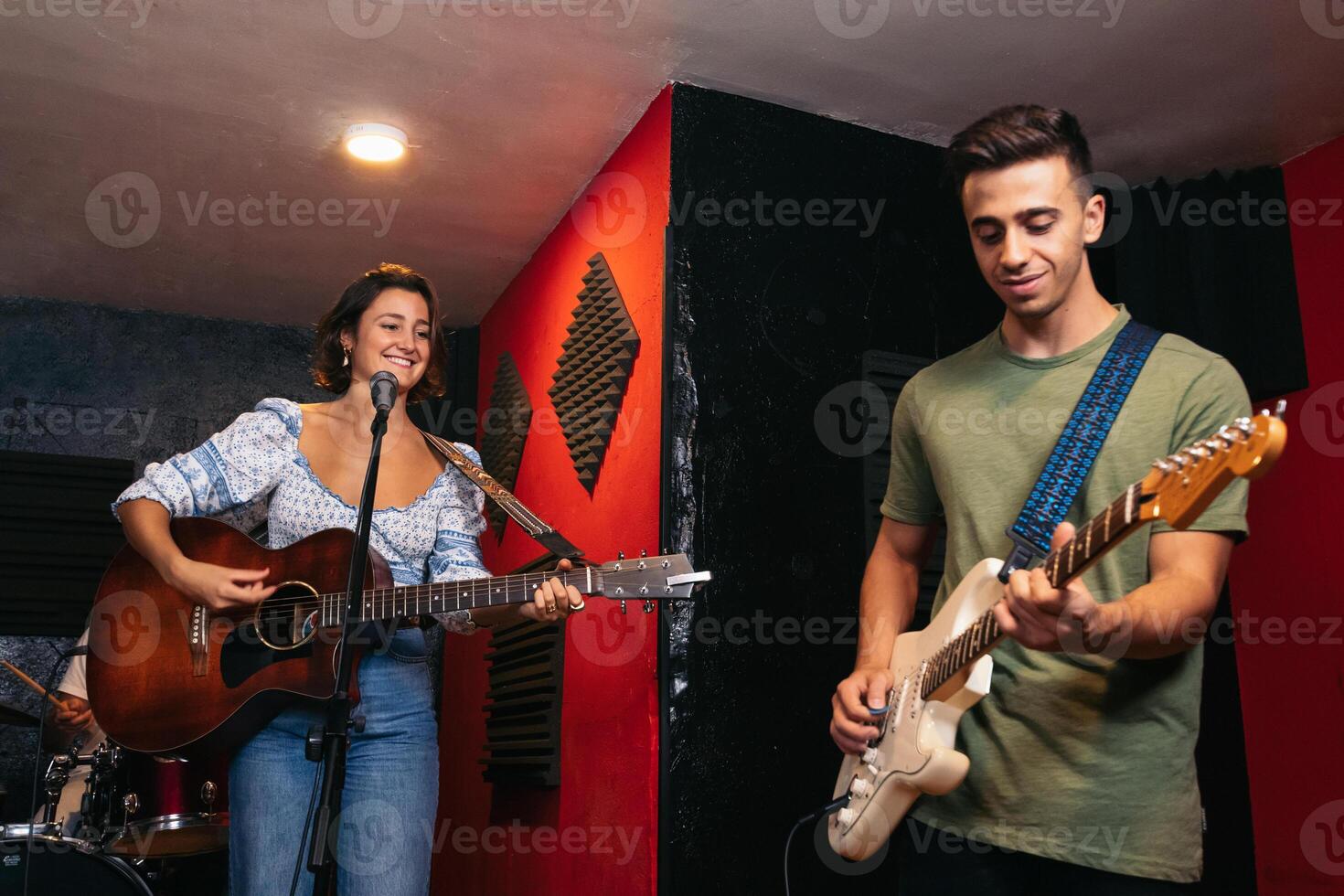 Music band rehearsing in a music venue. Practice makes perfect photo