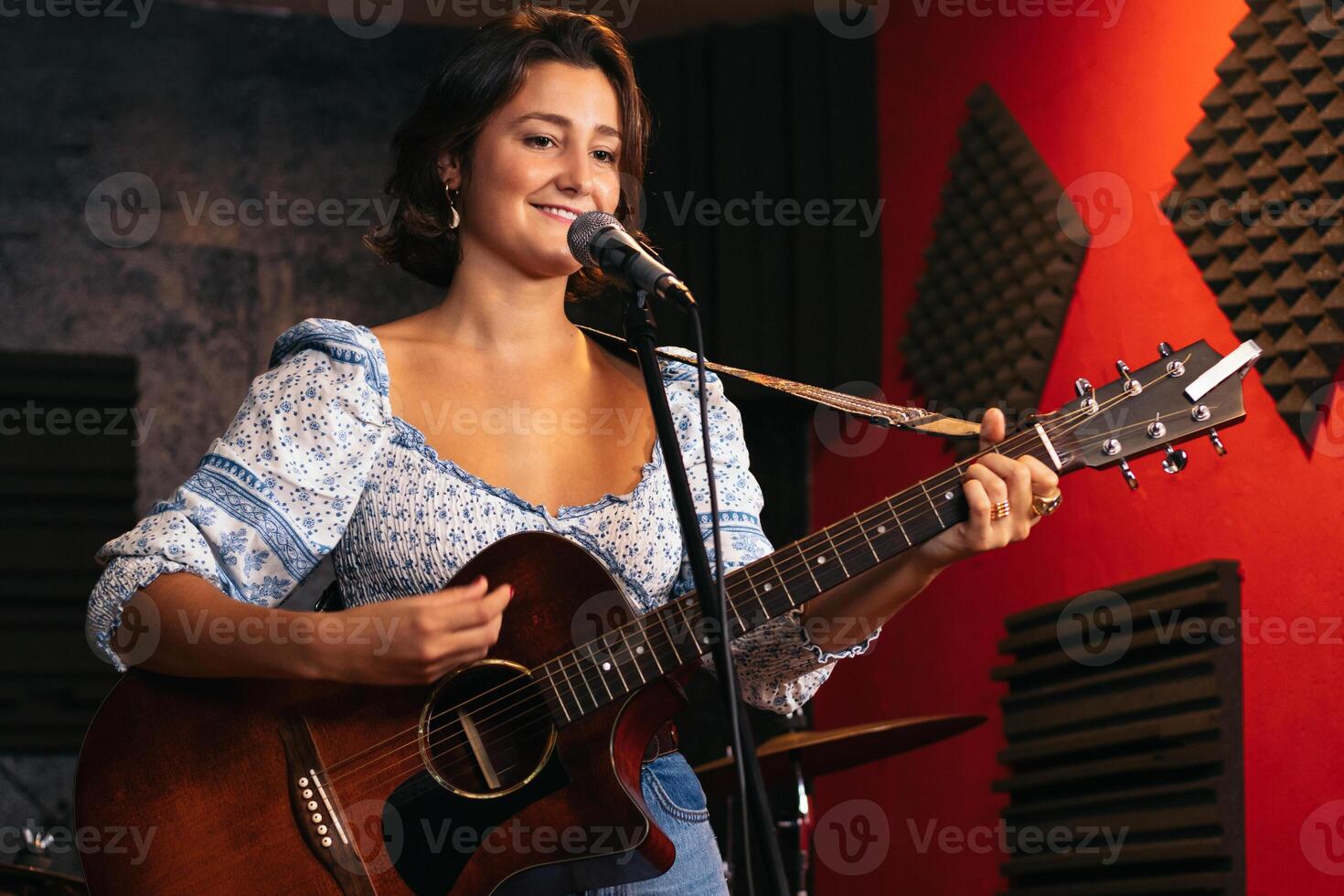 Close-up of a female singer rehearsing her songs photo