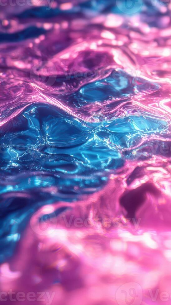 Waves of vibrant pink and blue hues create an abstract and mesmerizing water pattern in soft light photo