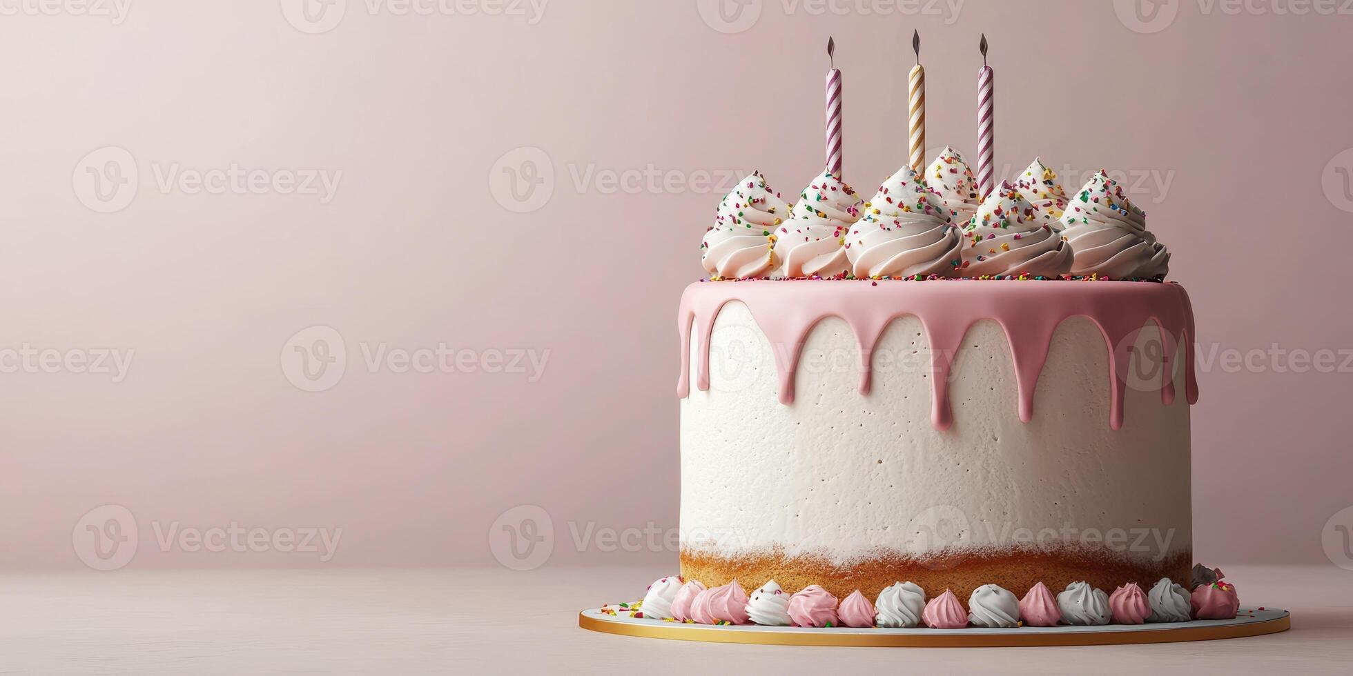 Delicious pink and white cake adorned with whipped cream, sprinkles, and candles on display for a special celebration photo