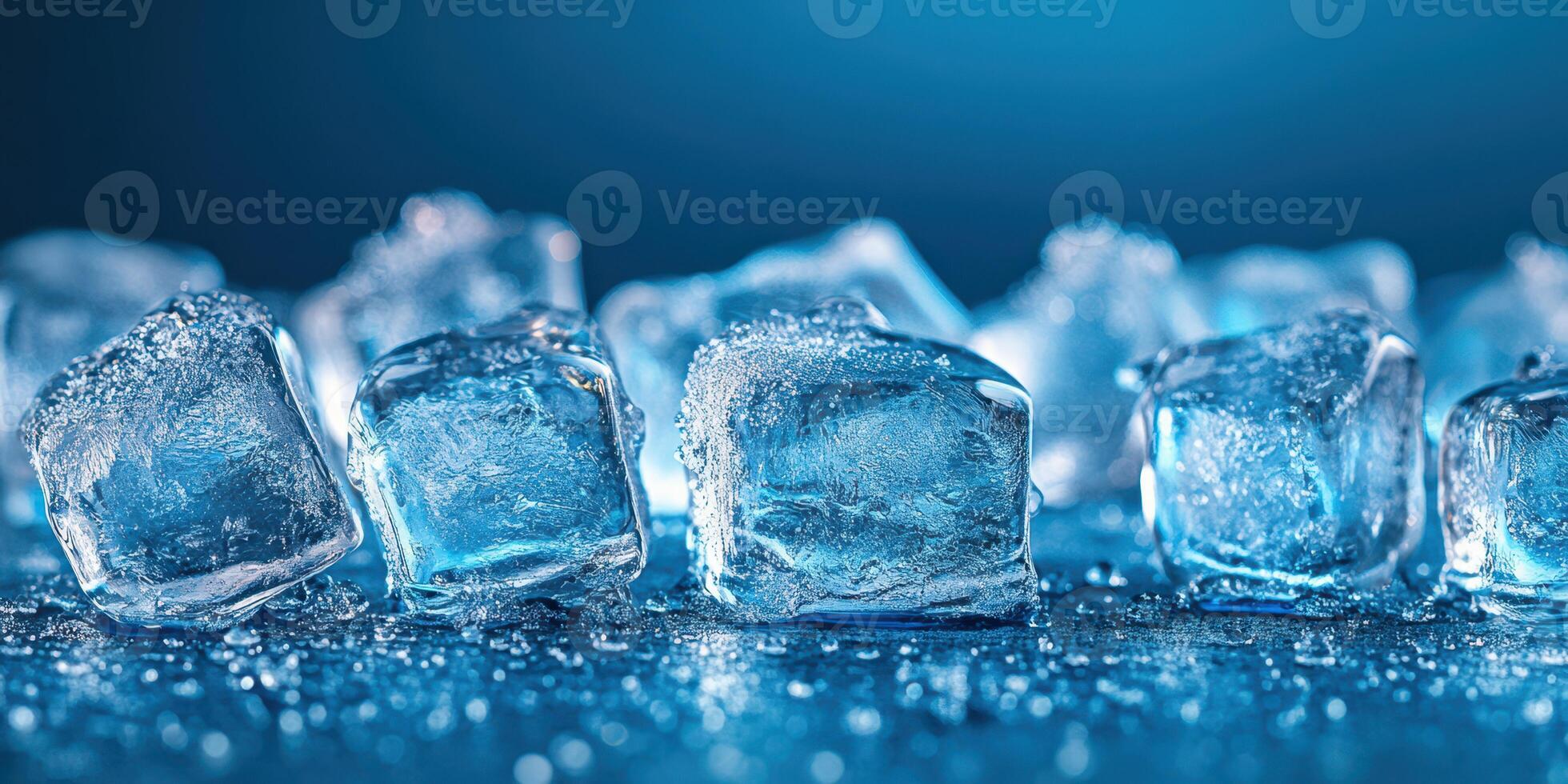 Clear ice cubes glistening on a surface reflecting light during a cool beverage experience photo