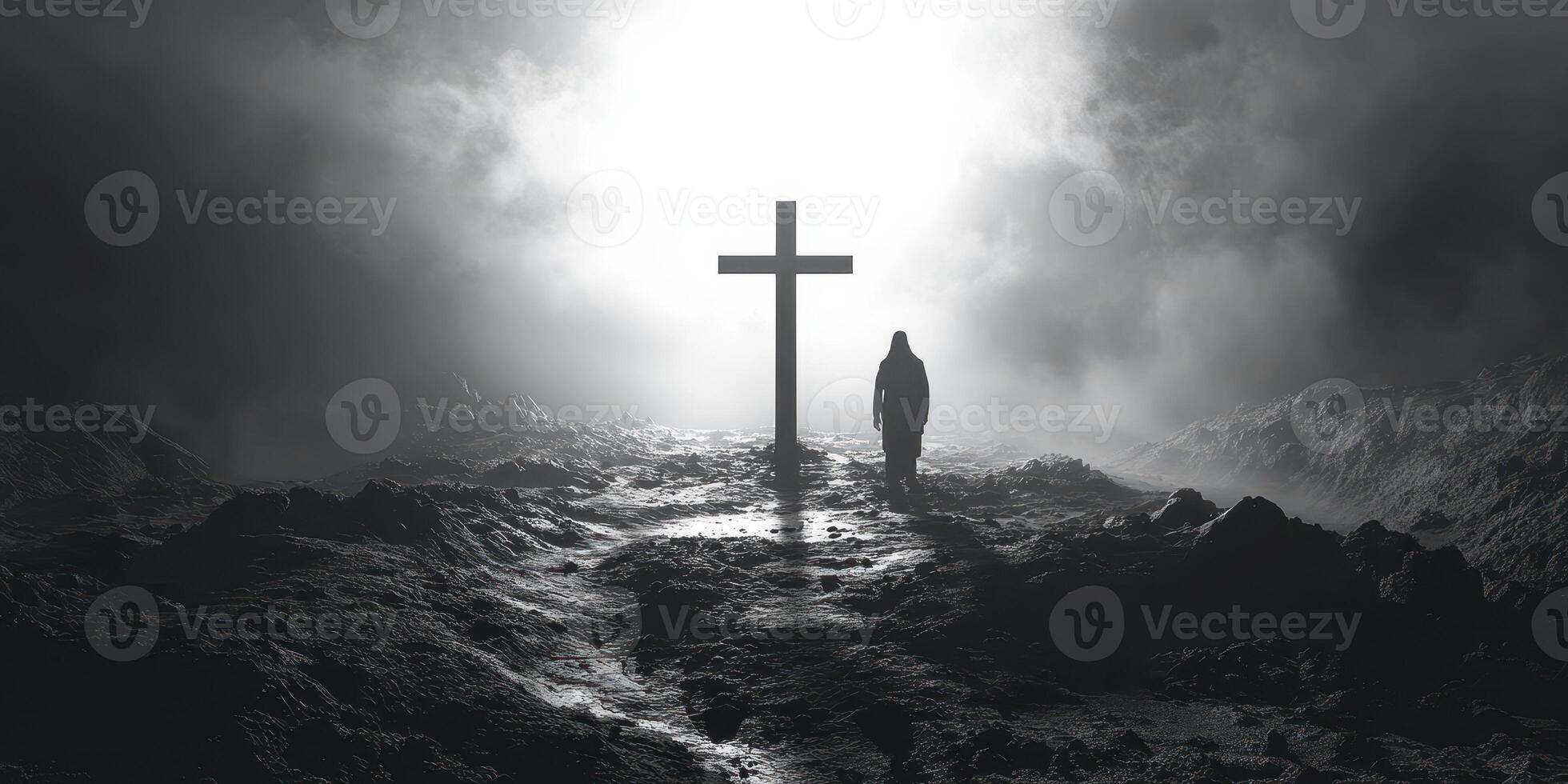 Solitary figure standing beside a cross on a foggy path in a dramatic black and white landscape photo