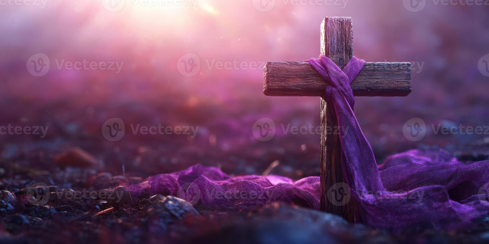 Wooden cross wrapped in purple cloth with soft light illuminating the background during a serene moment at twilight photo