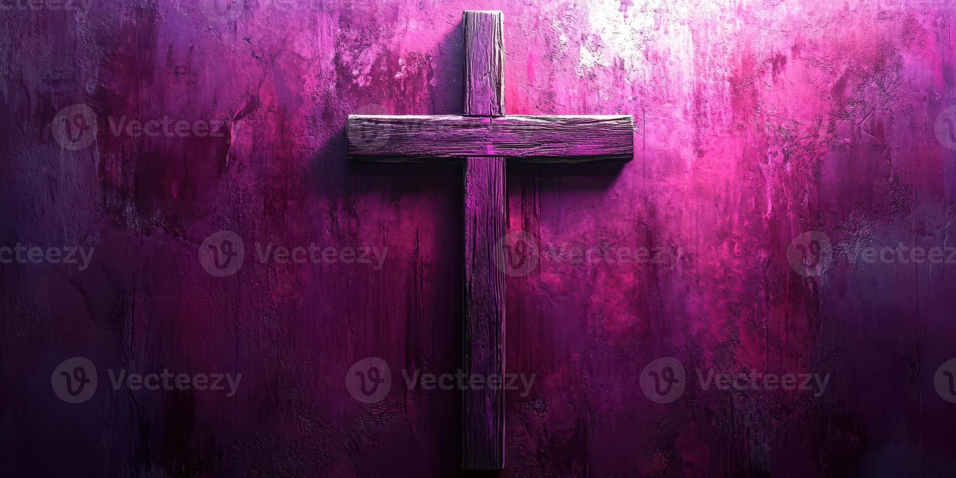 Illuminated wooden cross against a vibrant purple textured wall during evening light photo