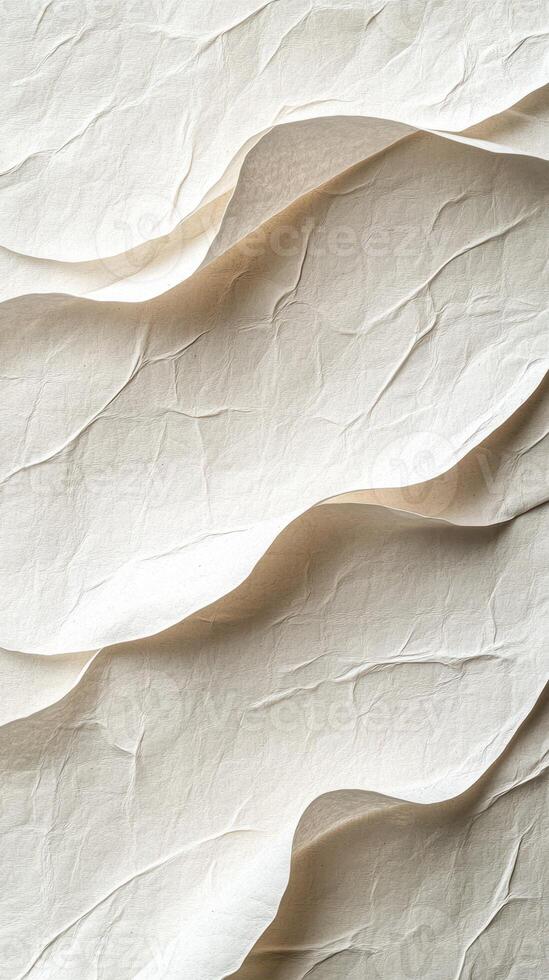 Textured white paper with wavy folds creates an artistic background for design projects or crafts photo