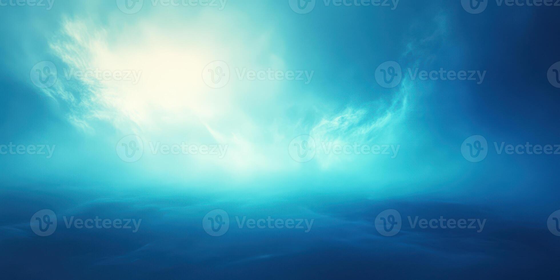 Vast blue ocean under bright cloudy sky at midday creates a serene atmosphere for relaxation photo