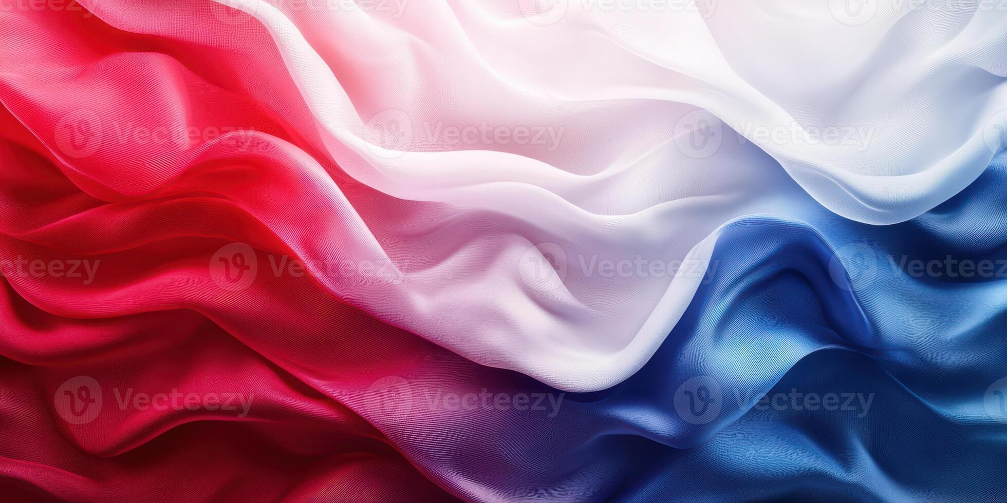 Vibrant textured fabric in red, white, and blue colors flowing gently in soft waves and folds photo
