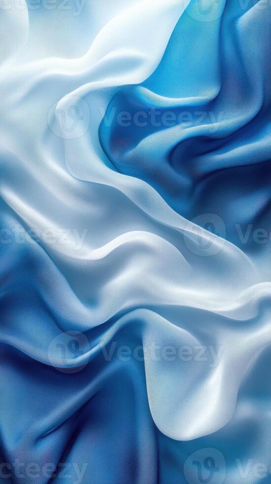 Soft blue silk fabric draping gracefully, creating calming waves in a serene textile display photo