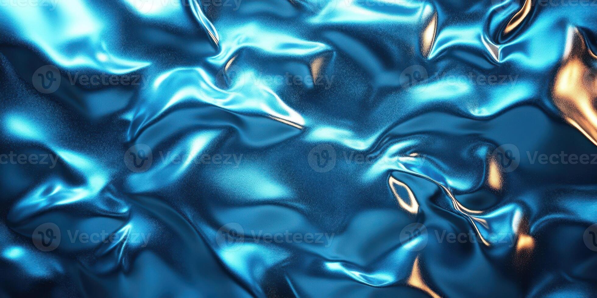 Shimmering blue and gold abstract texture resembling waves and folds in a fluid, reflective surface photo