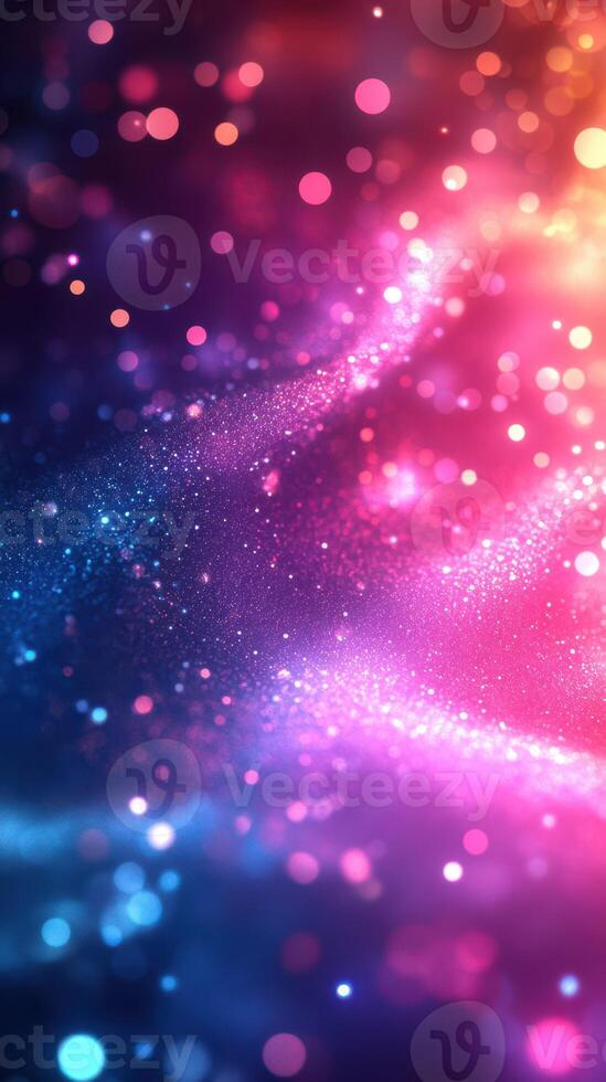 Colorful abstract texture features vibrant dots and shimmering light effects in a gradient from blue to pink photo