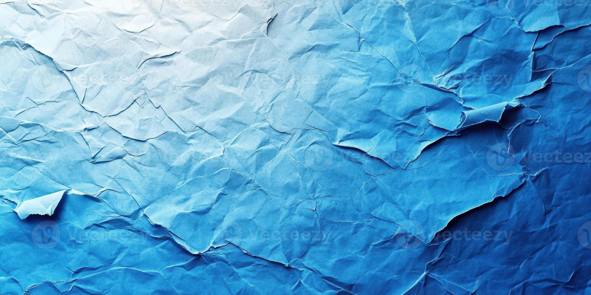 Textured blue paper background with crumpled folds ideal for creative designs and backgrounds photo