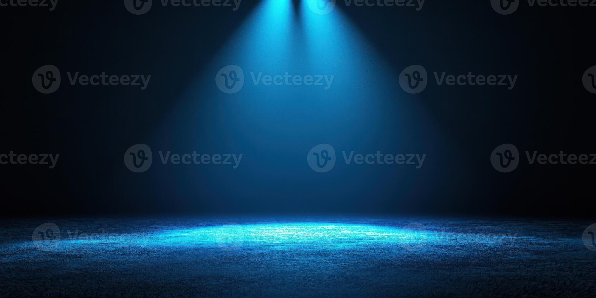 Bright blue spotlight illuminates empty stage in a darkened theater during a performance preparation photo