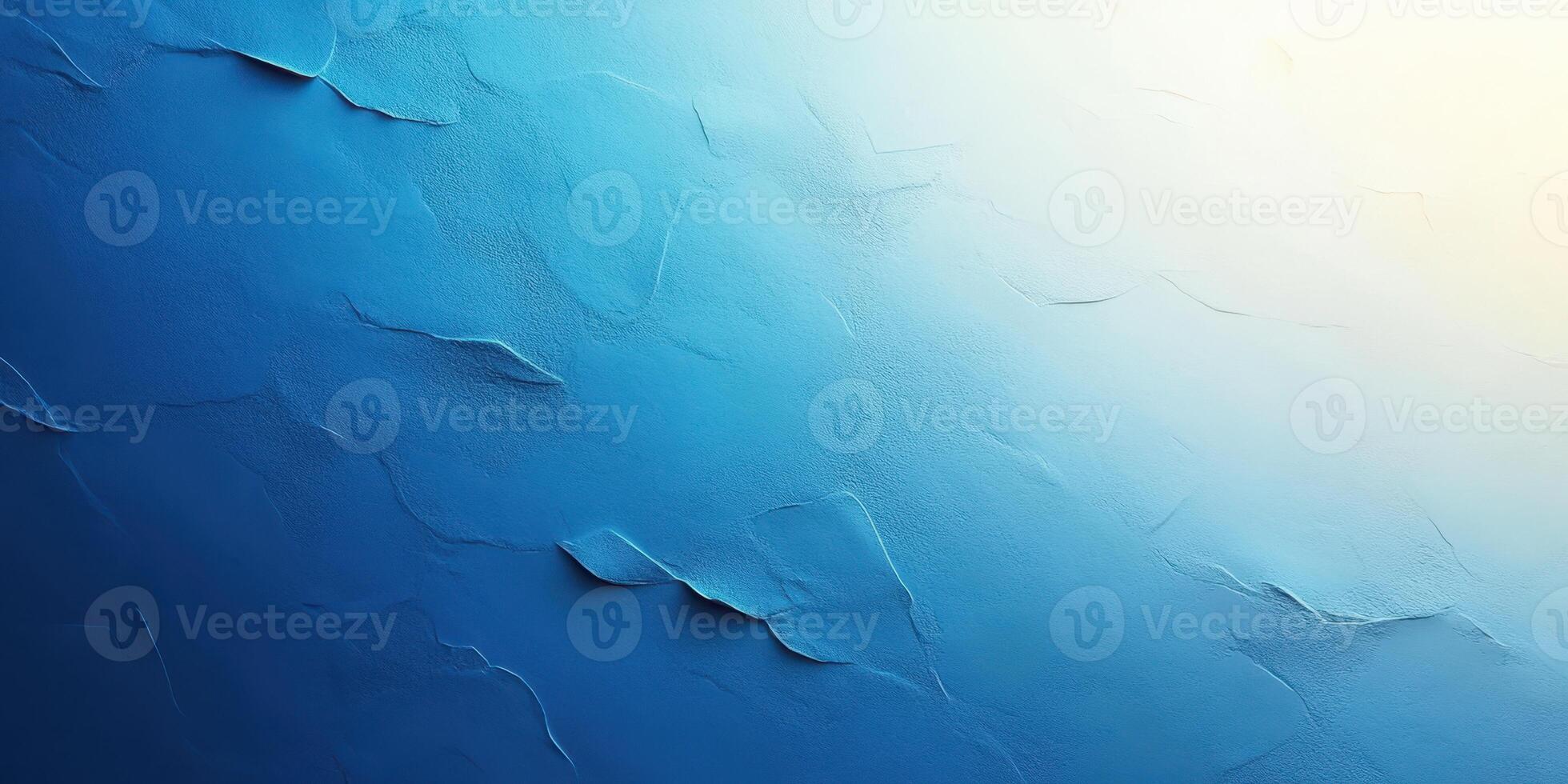 Textured abstract blue wall with subtle variations in tone and light, creating a calming atmosphere photo