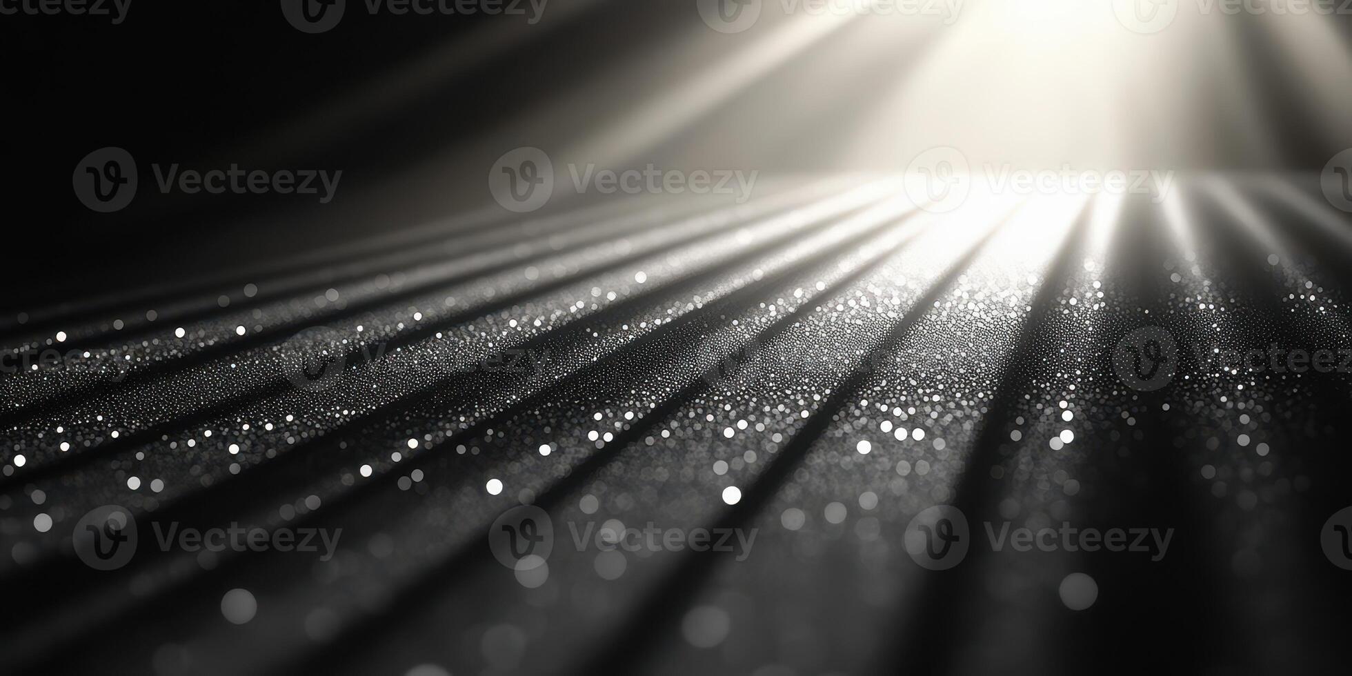Light beams illuminate sparkling particles on a textured surface in a dark setting photo