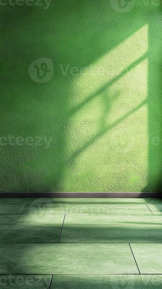 Bright green wall casting interesting shadows during afternoon sunlight in a minimalist interior space photo