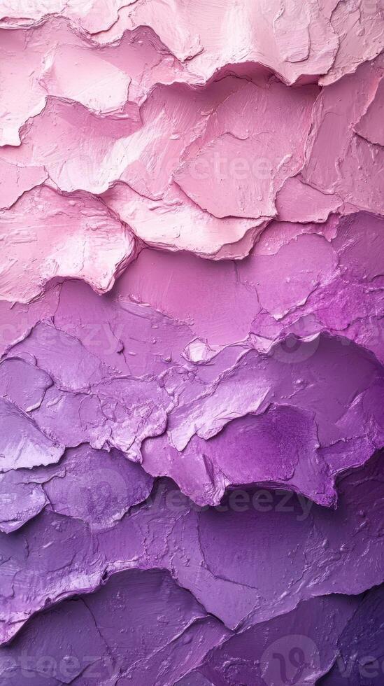 Vibrant layers of textured pink and purple paint create an abstract design full of depth and movement in a studio setting photo