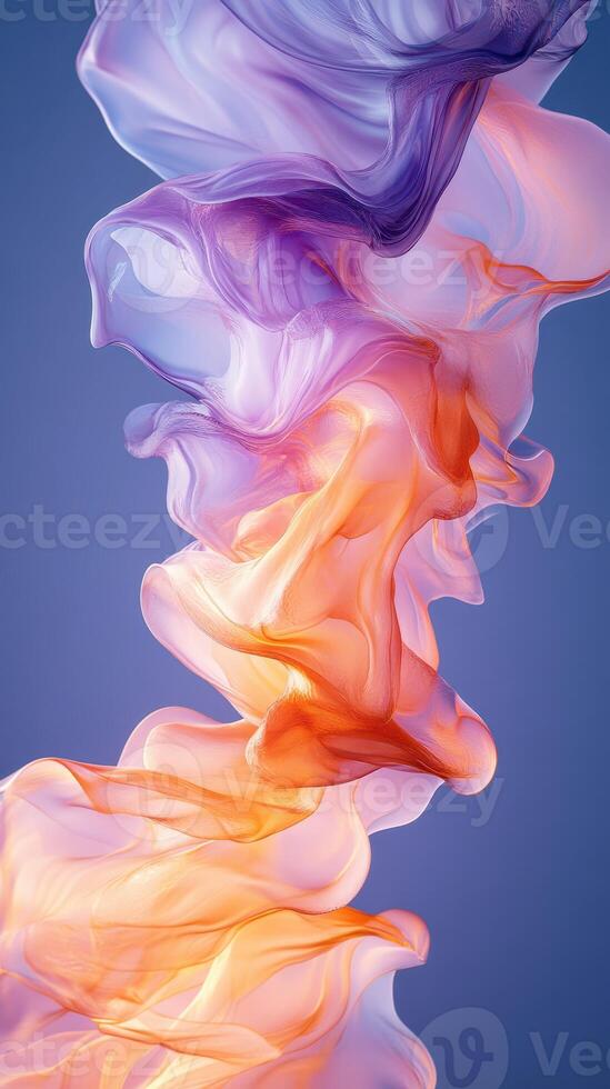 Colorful fabric flows gracefully in striking shades of orange, purple, and blue against a soft gradient backdrop photo